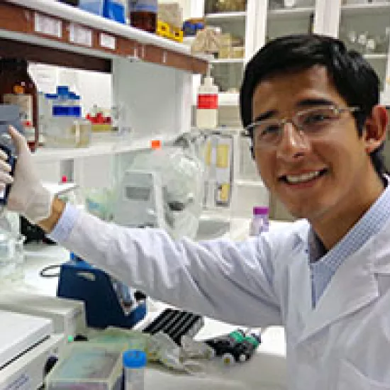 UTM science student Gustavo Gutierrez working in the lab. 