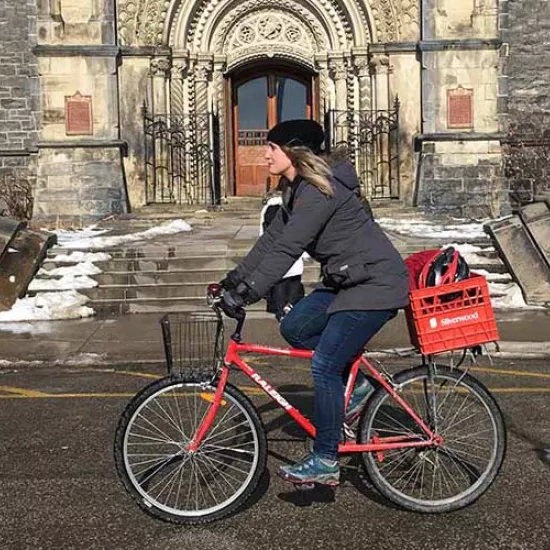 Léa Ravensbergen riding a bicycle