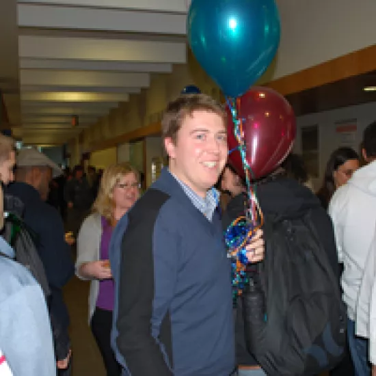 Image of library staff with balloons