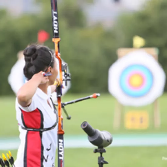 Archery featuring female athlete