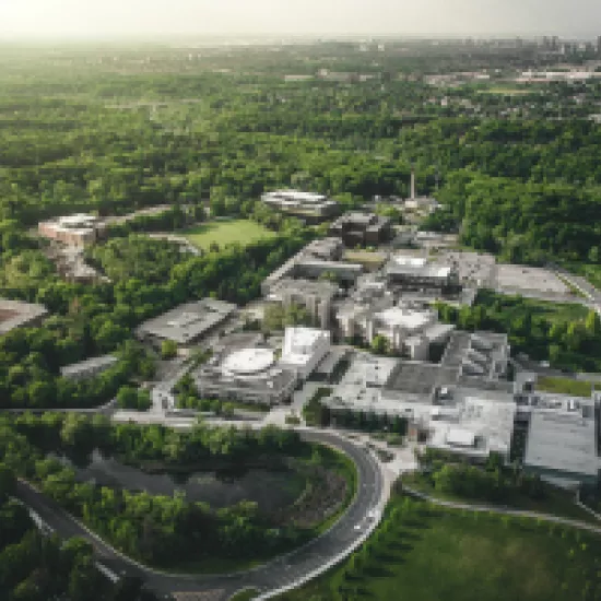 aerial photo of UTM campus surrounded by forest
