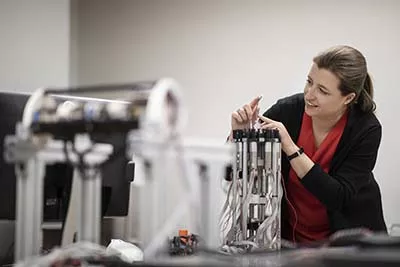 Jessica Burgner-Kahrs in the Robotics lab at UTM