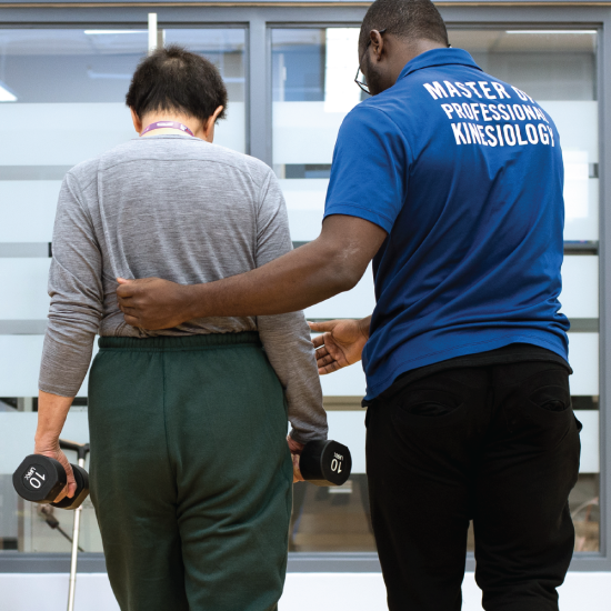 Photo of a physiotherapist helping a patient