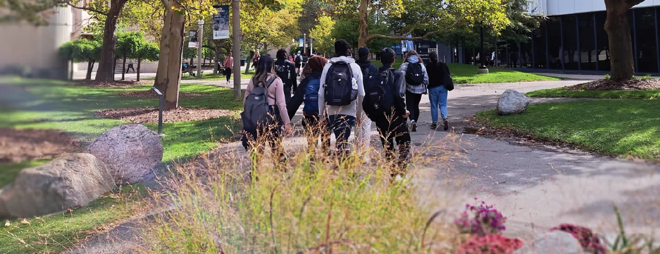 Students walking by the Innovation Complex