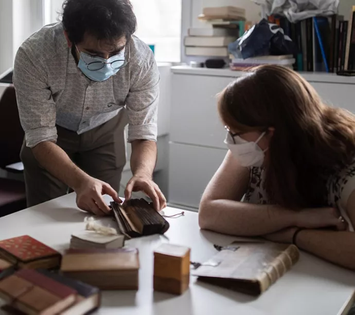 Students examine historical bookmaking techniques