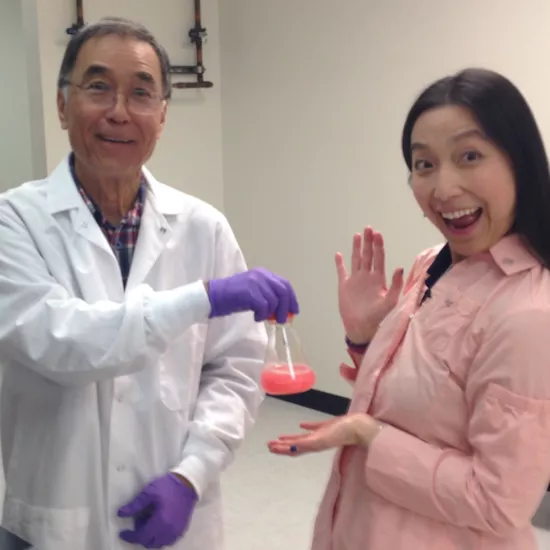 Dr. Marty Ikkanda and Kristina Han examining transformed bacteria